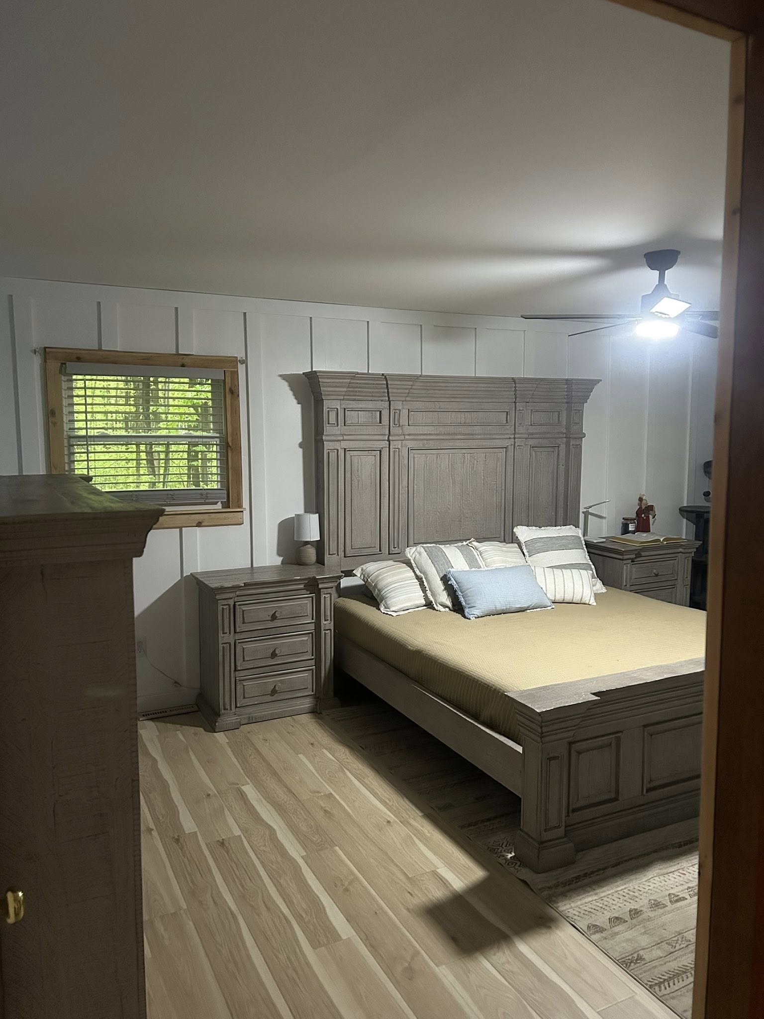 Master bedroom after complete renovation with modern design elements